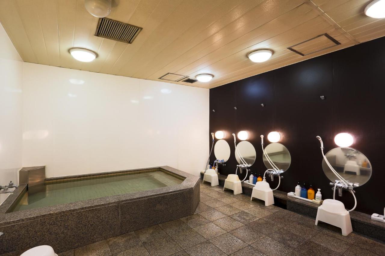 Hotel Capsule Land Yushima Tokyo Esterno foto