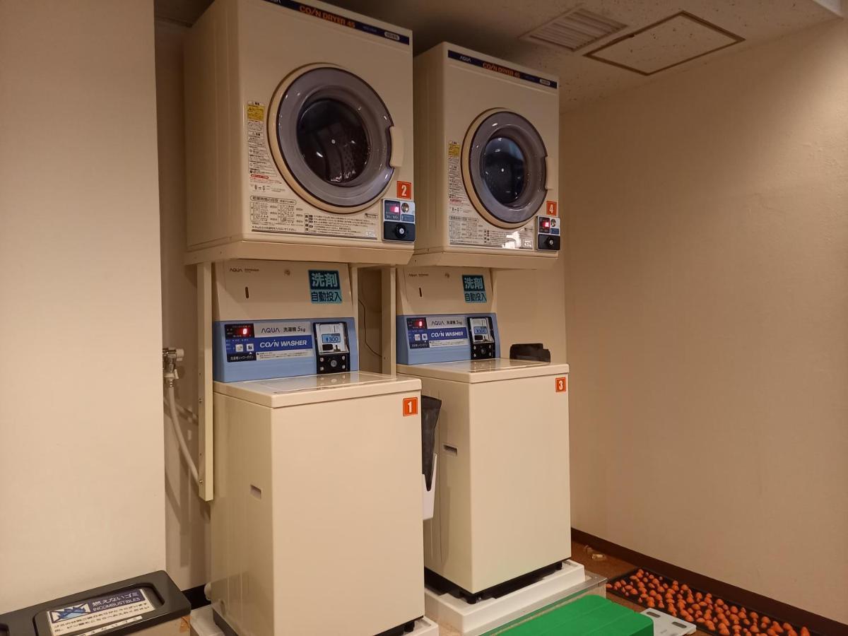 Hotel Capsule Land Yushima Tokyo Esterno foto